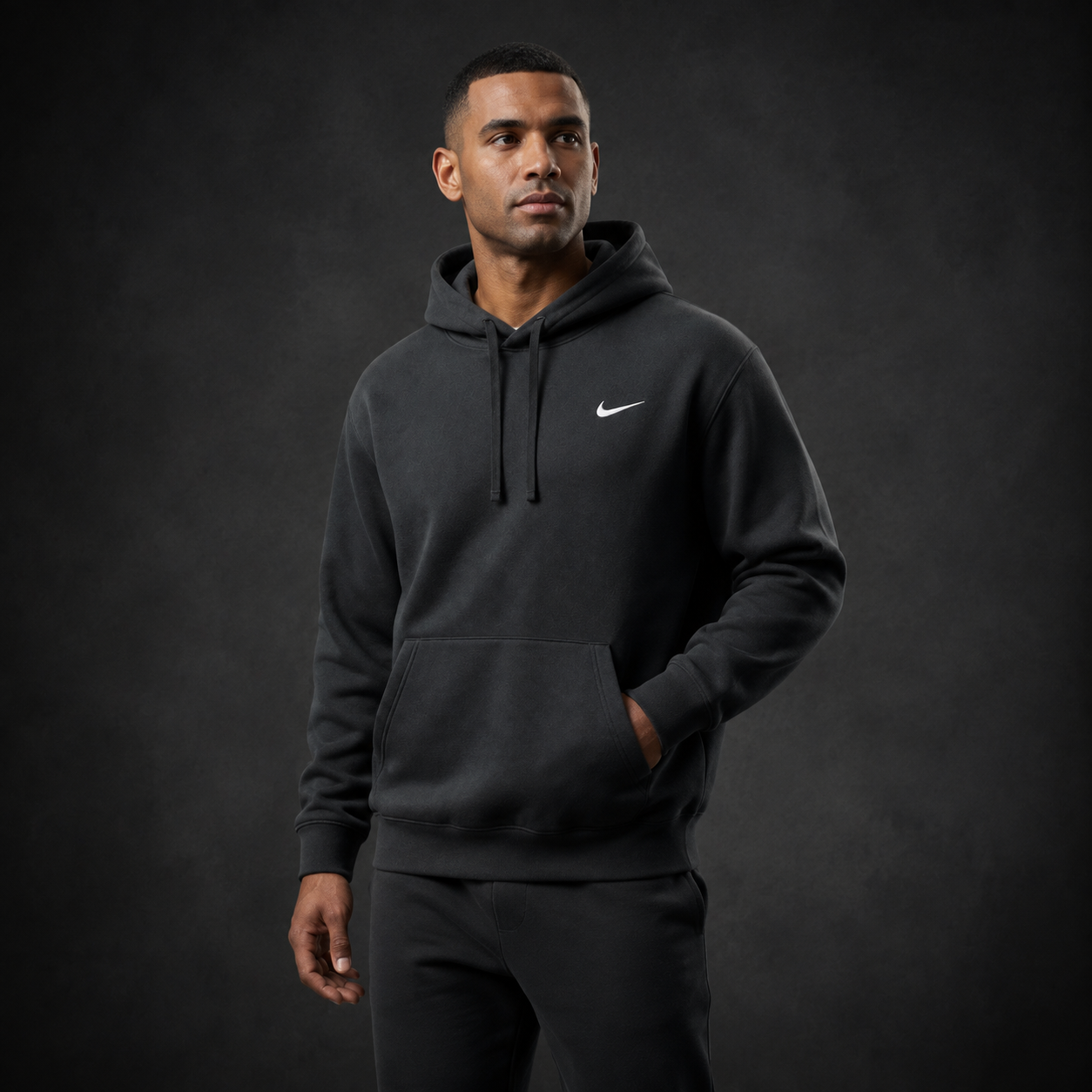 Athletic model wearing the FCTR Apparel Nike Club Hoodie