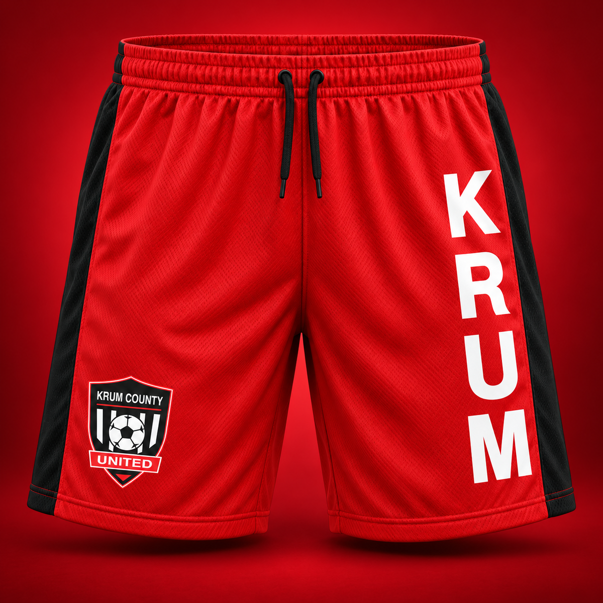 Red mesh Krum County United shorts with vertical white KRUM lettering and an opposite-leg crest.