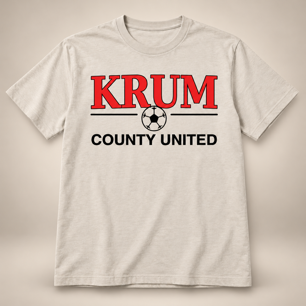 Stone men's Krum County United T-shirt with red collegiate lettering and a black soccer ball graphic.