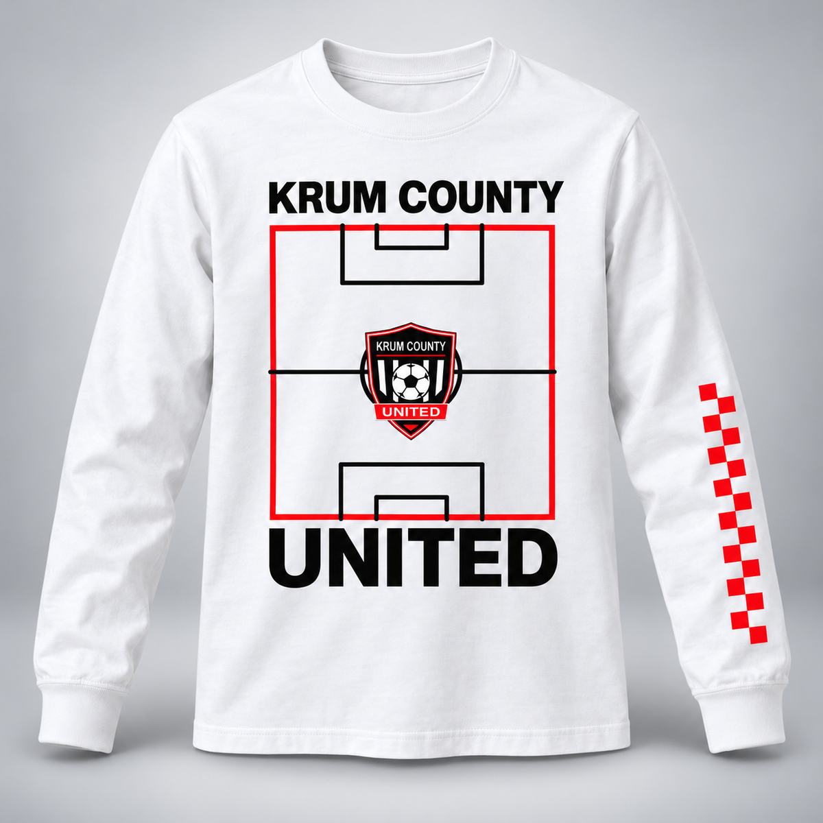 White youth Krum County United long sleeve with a pitch graphic and red checker sleeve detail.